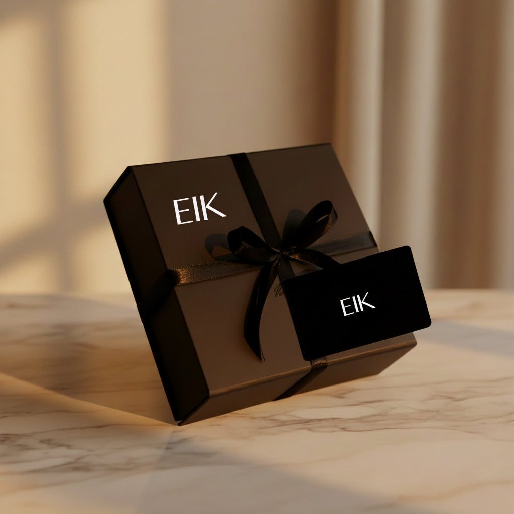 A black Elegance Is Key Home Collection Gift card packaging with the brand logo 'EIK' on the front.